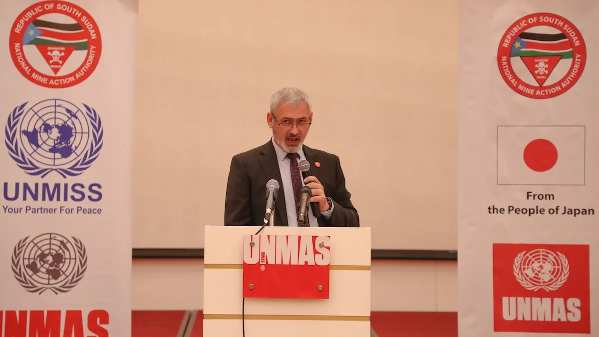 Zehrudin Sukanovic, Chief of the UN Mine Action Service in South Sudan giving a speech behind a podium