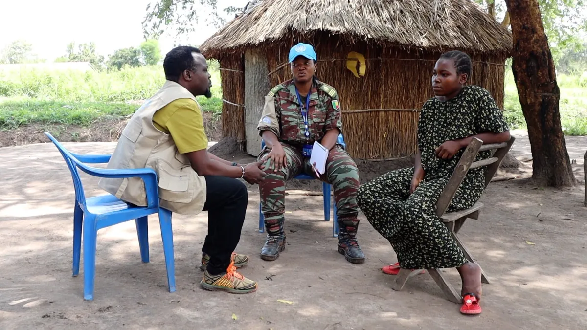 UNMISS staff speak with community members in Rii-rangu  