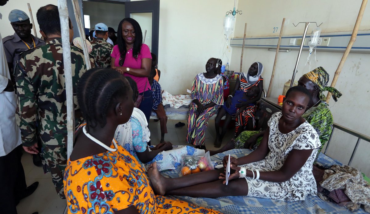 UNMISS staff members donate food and clothes at a women’s hospital in Rumbek