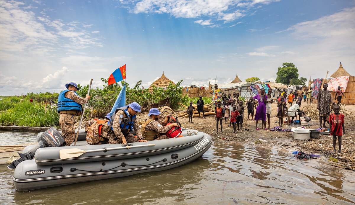 Peace South Sudan UNMISS UN peacekeeping peacekeepers elections constitution unity boat patrol Mongolian peacekeepers 