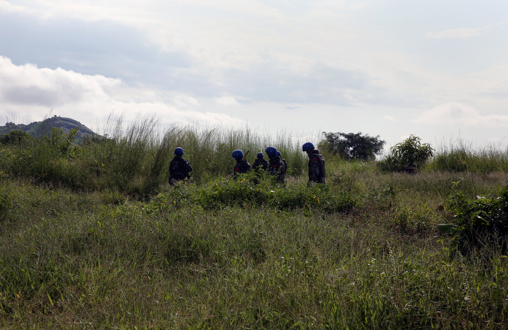 UNMISS Peacekeepers perform weapons sweep on the outskirts of PoC site 3, Juba