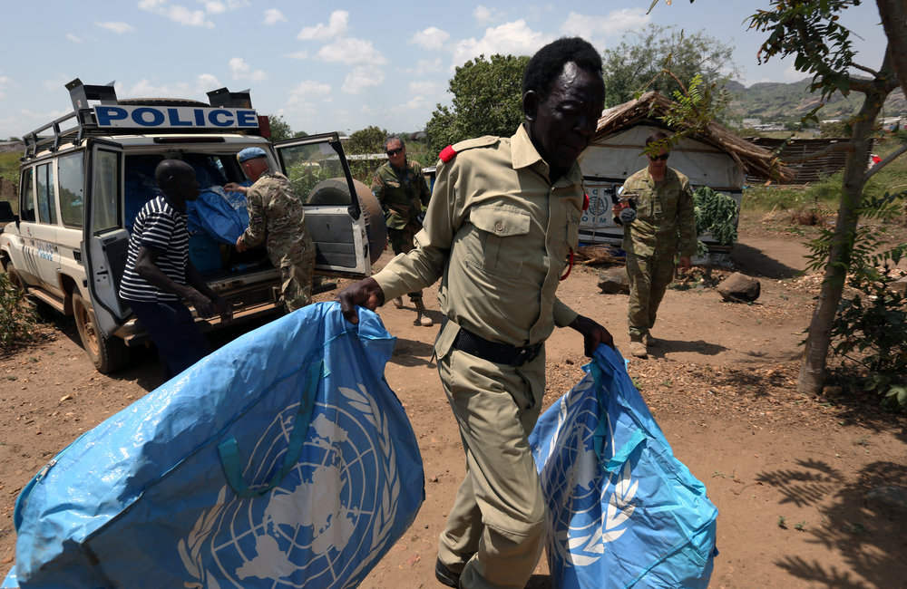Int. Day of Peace 2016; Peacekeepers supply essential household goods to the village of Makituni on the outskirts of UN Base, Jebel area