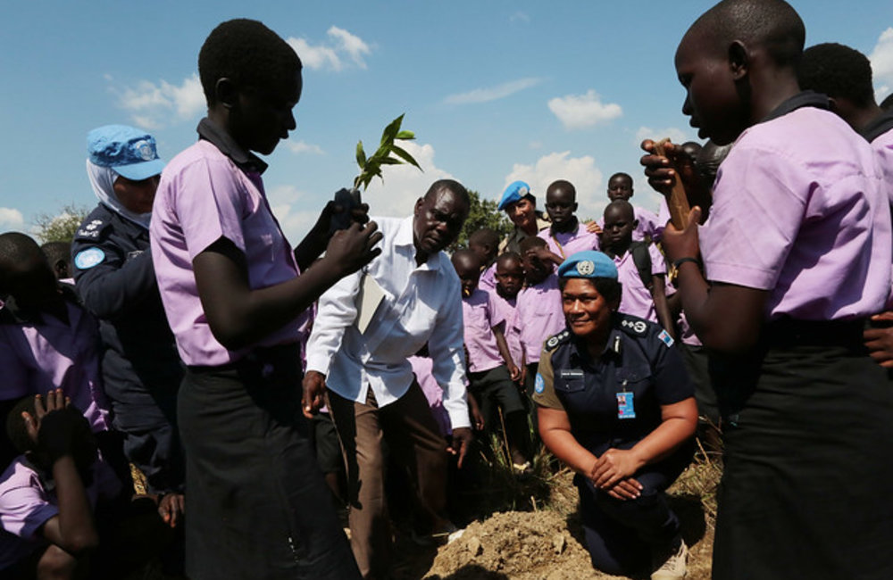 UNMISS police officers celebrate International Day of the Girl Child at school in Juba