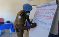 UN police officers in Aweil raise awareness on sexual abuse and hand out sanitary pads to schoolgirls