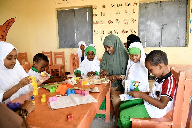 Vibrant classroom scene filled with young children Vibrant classroom scene filled with young children